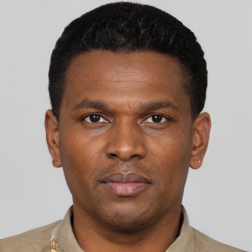 Neutral black young-adult male with short  black hair and brown eyes