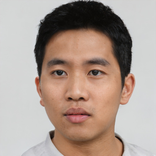 Neutral asian young-adult male with short  black hair and brown eyes