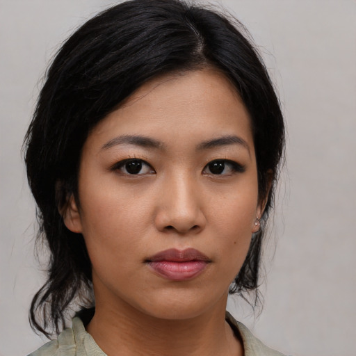 Neutral asian young-adult female with medium  black hair and brown eyes