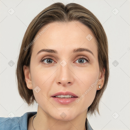 Joyful white young-adult female with medium  brown hair and grey eyes