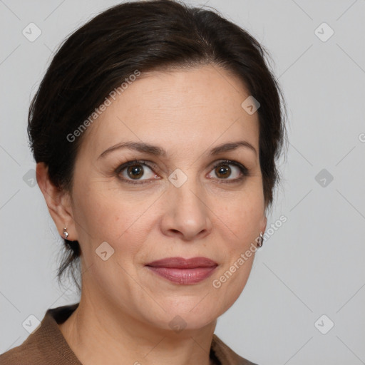 Joyful white adult female with medium  brown hair and grey eyes