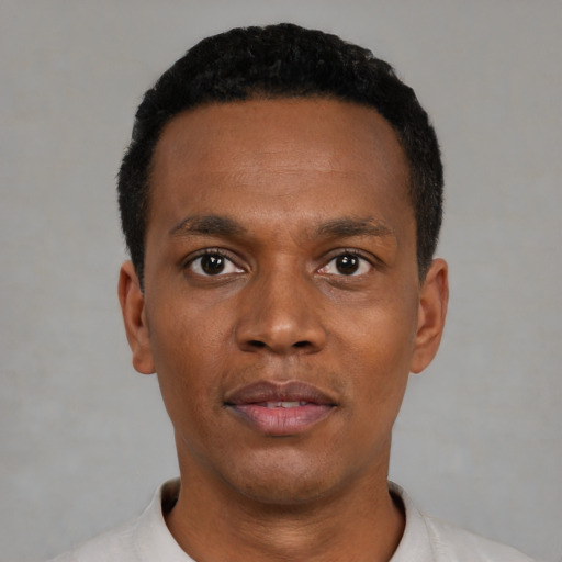 Neutral black young-adult male with short  black hair and brown eyes