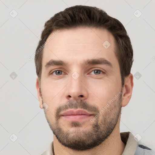 Neutral white young-adult male with short  brown hair and brown eyes