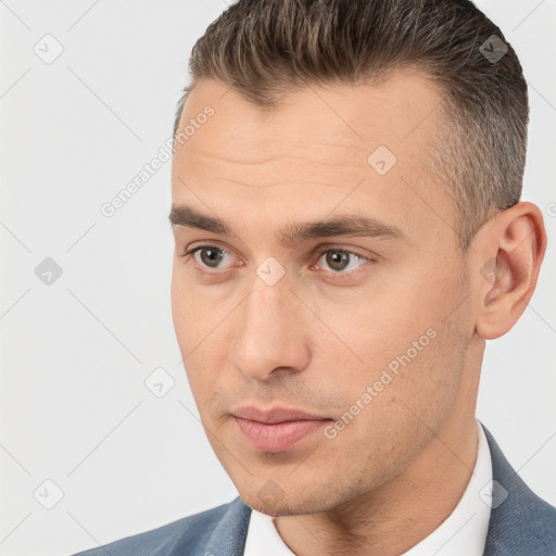 Neutral white young-adult male with short  brown hair and brown eyes