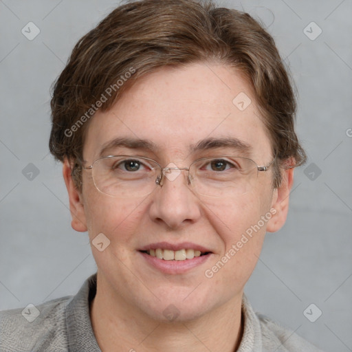 Joyful white adult female with short  brown hair and grey eyes