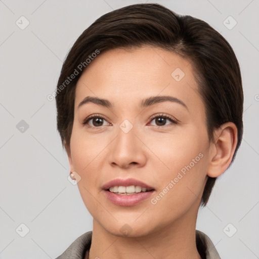 Joyful white young-adult female with short  brown hair and brown eyes