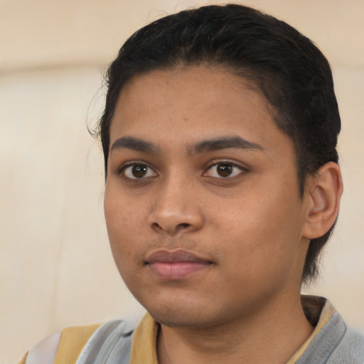 Neutral latino young-adult female with short  black hair and brown eyes