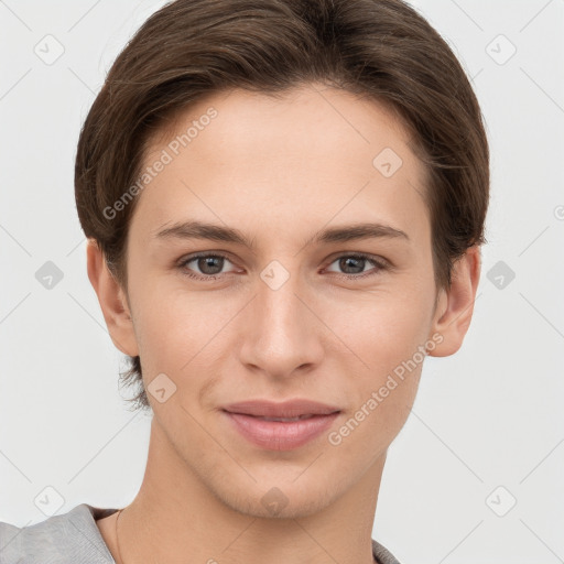 Joyful white young-adult female with short  brown hair and grey eyes