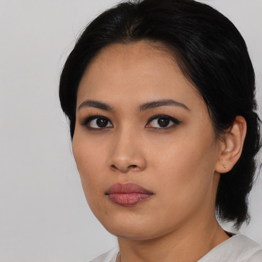 Neutral asian young-adult female with medium  black hair and brown eyes