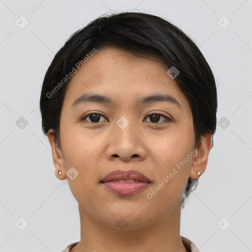 Joyful asian young-adult female with short  black hair and brown eyes