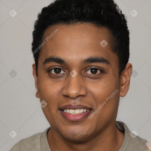 Joyful black young-adult male with short  black hair and brown eyes