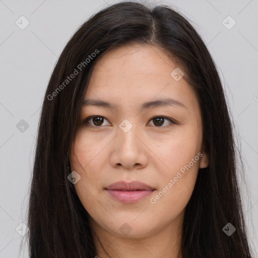 Joyful asian young-adult female with long  brown hair and brown eyes