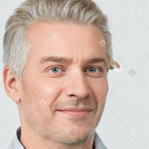 Joyful white adult male with short  brown hair and grey eyes