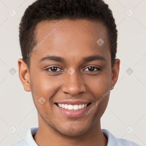 Joyful black young-adult male with short  brown hair and brown eyes