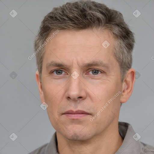 Neutral white adult male with short  brown hair and brown eyes