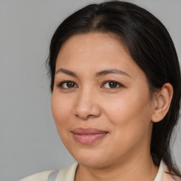 Joyful asian young-adult female with medium  brown hair and brown eyes