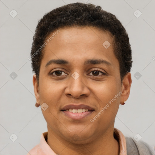 Joyful latino young-adult male with short  brown hair and brown eyes