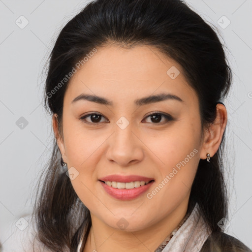 Joyful asian young-adult female with medium  brown hair and brown eyes