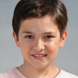 Joyful white child male with short  brown hair and brown eyes