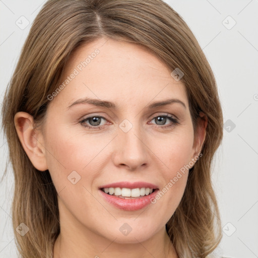 Joyful white young-adult female with long  brown hair and grey eyes