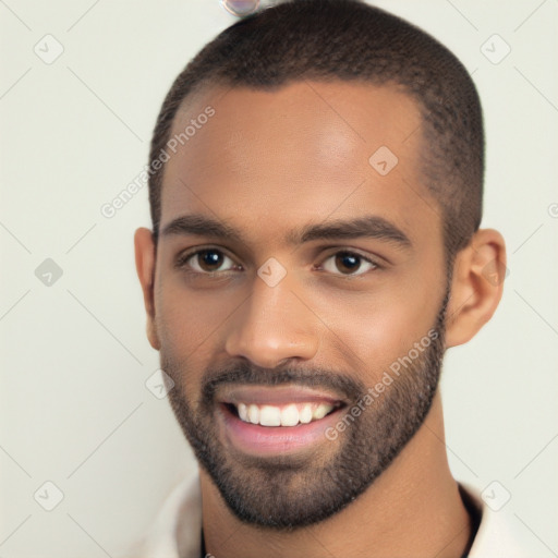 Joyful white young-adult male with short  black hair and brown eyes