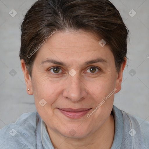 Joyful white adult female with short  brown hair and brown eyes