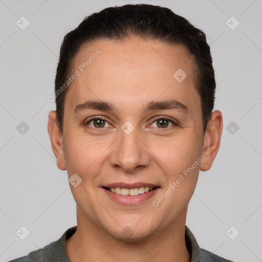 Joyful white adult female with short  brown hair and brown eyes