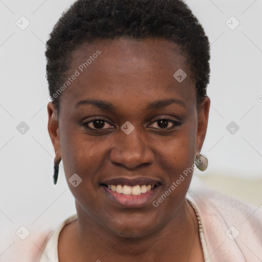 Joyful black young-adult female with short  brown hair and brown eyes