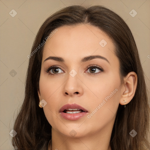 Neutral white young-adult female with long  brown hair and brown eyes