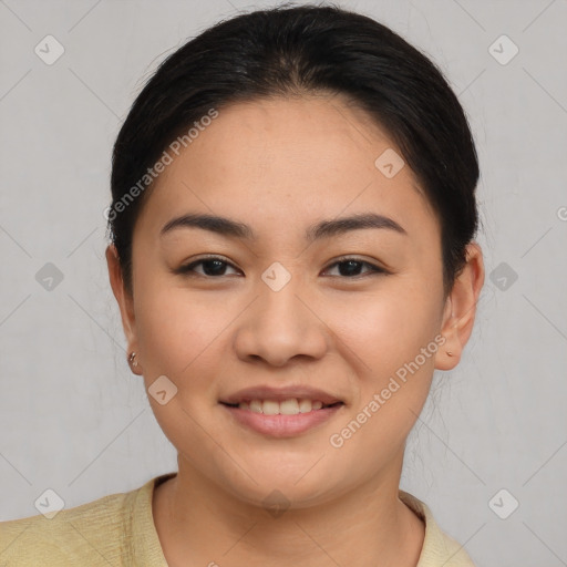 Joyful asian young-adult female with medium  brown hair and brown eyes