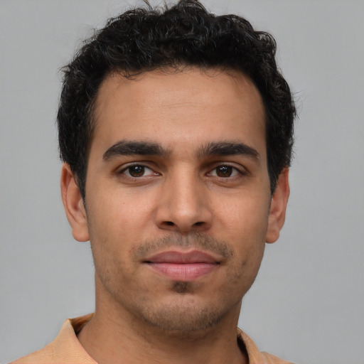 Neutral latino young-adult male with short  brown hair and brown eyes