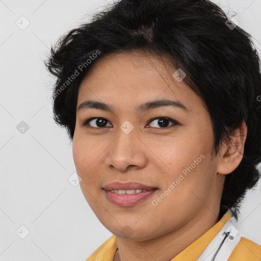 Joyful asian young-adult female with short  brown hair and brown eyes