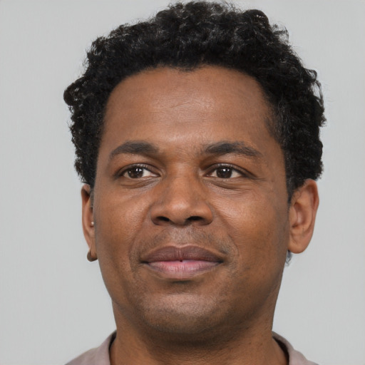 Neutral black young-adult male with short  brown hair and brown eyes