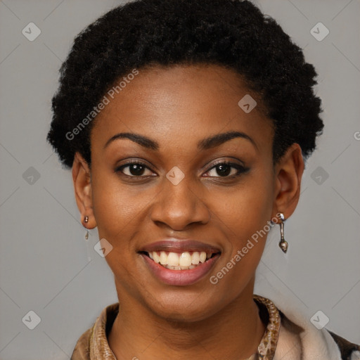 Joyful black young-adult female with short  brown hair and brown eyes