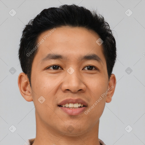 Joyful asian young-adult male with short  black hair and brown eyes