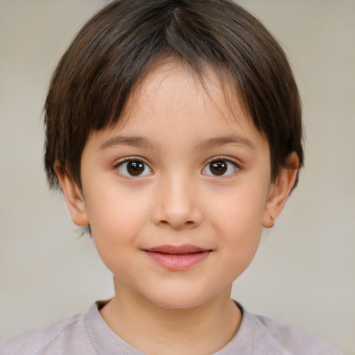 Joyful white child female with short  brown hair and brown eyes