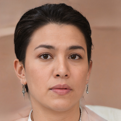Neutral white young-adult female with medium  brown hair and brown eyes