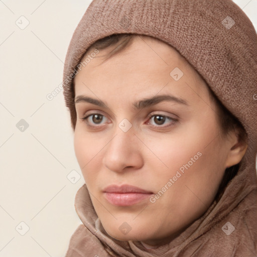 Neutral white young-adult female with long  brown hair and brown eyes