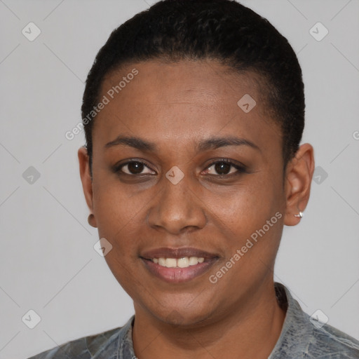 Joyful black young-adult female with short  black hair and brown eyes