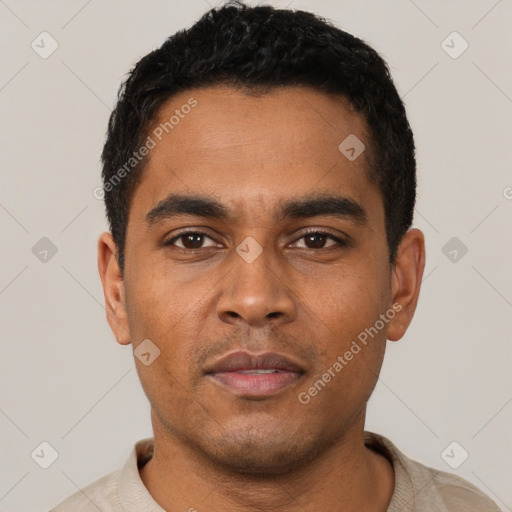 Neutral latino young-adult male with short  black hair and brown eyes