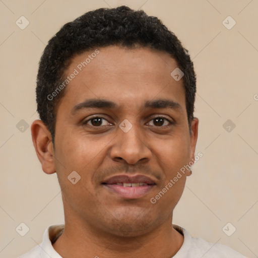 Joyful latino young-adult male with short  brown hair and brown eyes