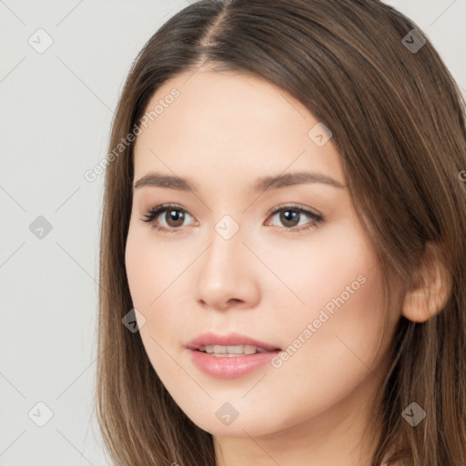 Neutral white young-adult female with long  brown hair and brown eyes