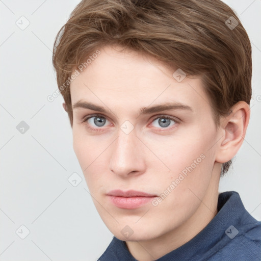 Neutral white young-adult male with short  brown hair and grey eyes