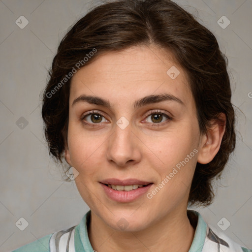 Joyful white young-adult female with medium  brown hair and green eyes