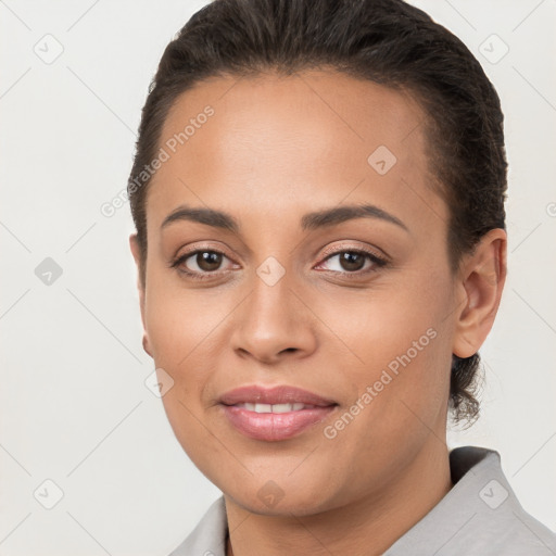 Joyful white young-adult female with short  brown hair and brown eyes