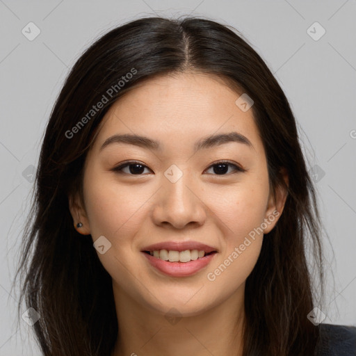 Joyful asian young-adult female with long  brown hair and brown eyes