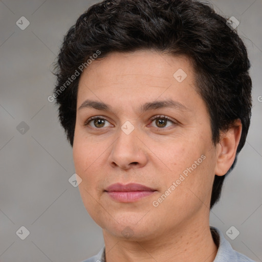 Joyful white adult female with short  brown hair and brown eyes