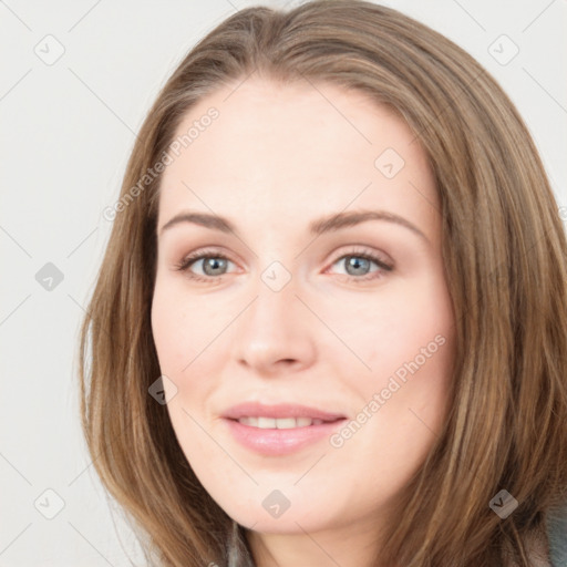 Joyful white young-adult female with long  brown hair and blue eyes