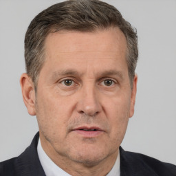 Neutral white middle-aged male with short  brown hair and brown eyes