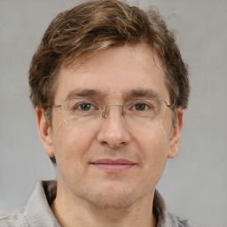 Neutral white adult male with short  brown hair and grey eyes